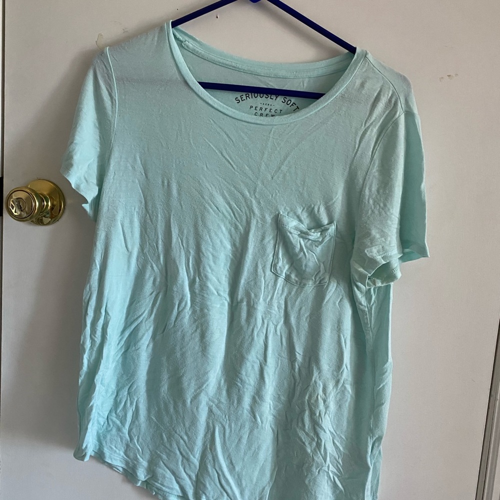 Blue tee with cigarette pocket